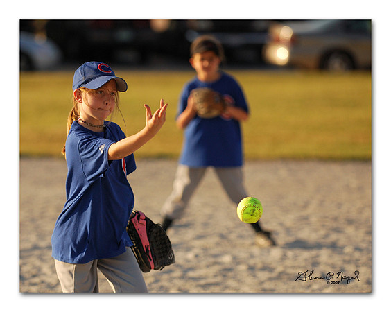 Allie tosses a pitch