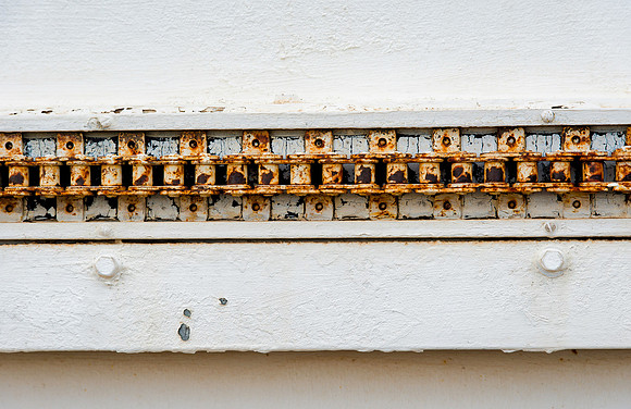 Rusty chain on white