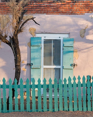 Green fence and shutters