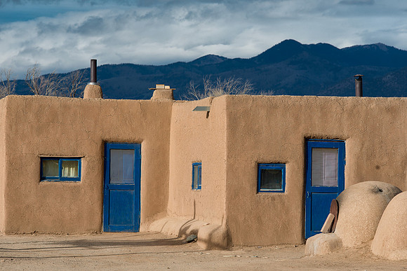 Blue doors and blue mountains