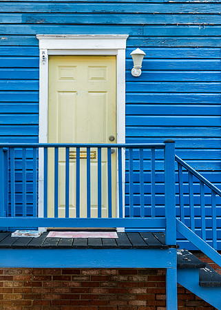 White door on blue