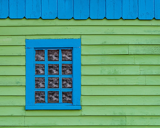 Blue on Green Window Frame