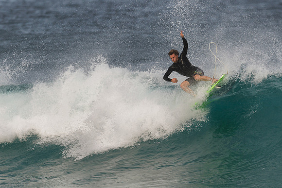 Surfing at Banzai Pipeline