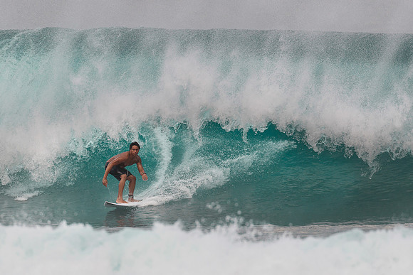 Surfing at Banzai Pipeline
