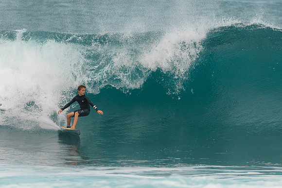 Surfing at Banzai Pipeline