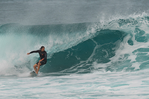 Surfing at Banzai Pipeline