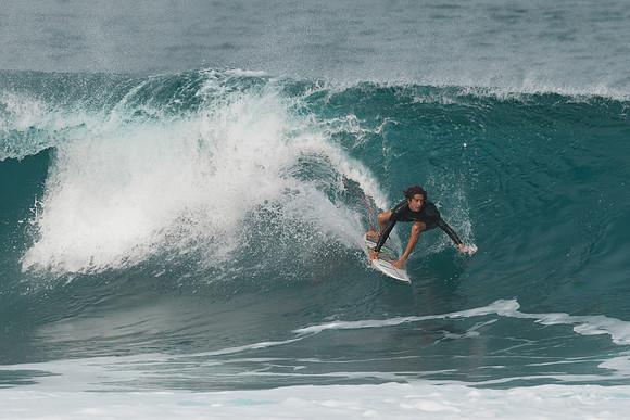 Surfing at Banzai Pipeline