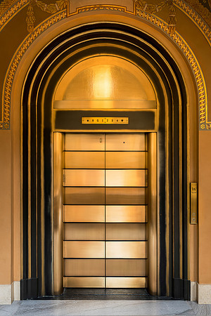 Golden elevator doors