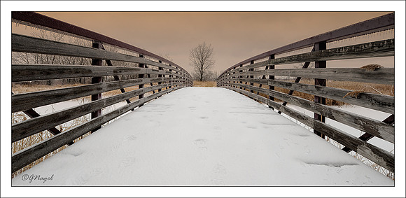 Snow covered bridge