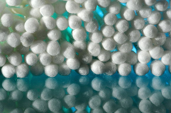 Reflected Q-Tips in green and blue