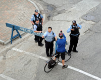 Four policemen and a biker