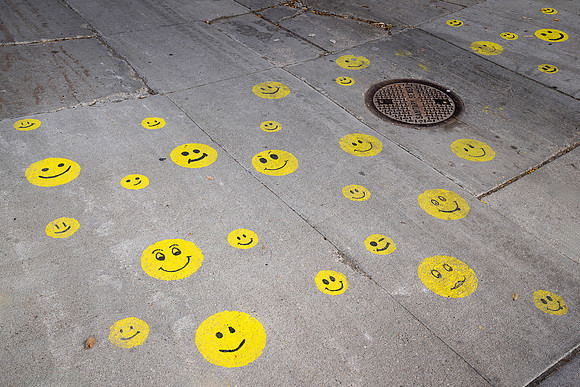 Smiley faces in alley