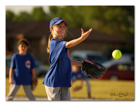 Allie lobs a pitch