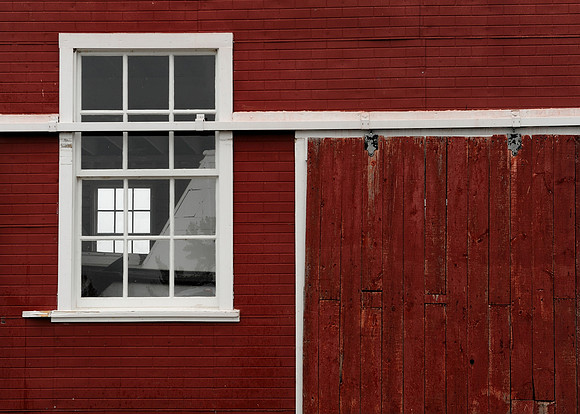 Window on red wall