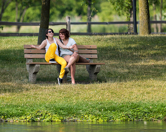Laughing on a bench