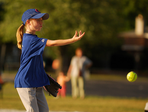 Allie tosses a pitch