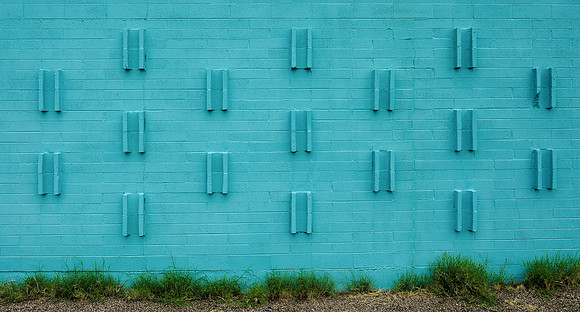 Turquoise wall with pattern
